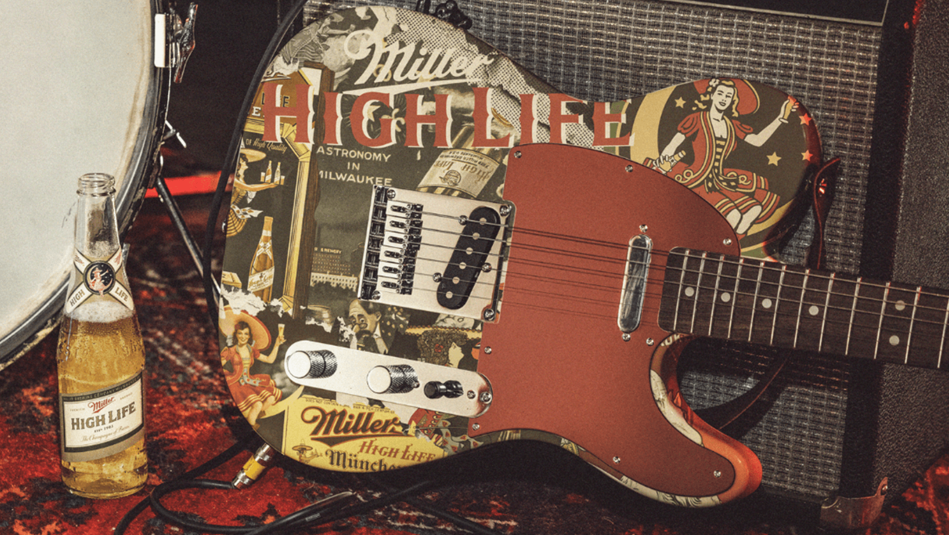 Guitar and beet bottle with Fender and High Life branding